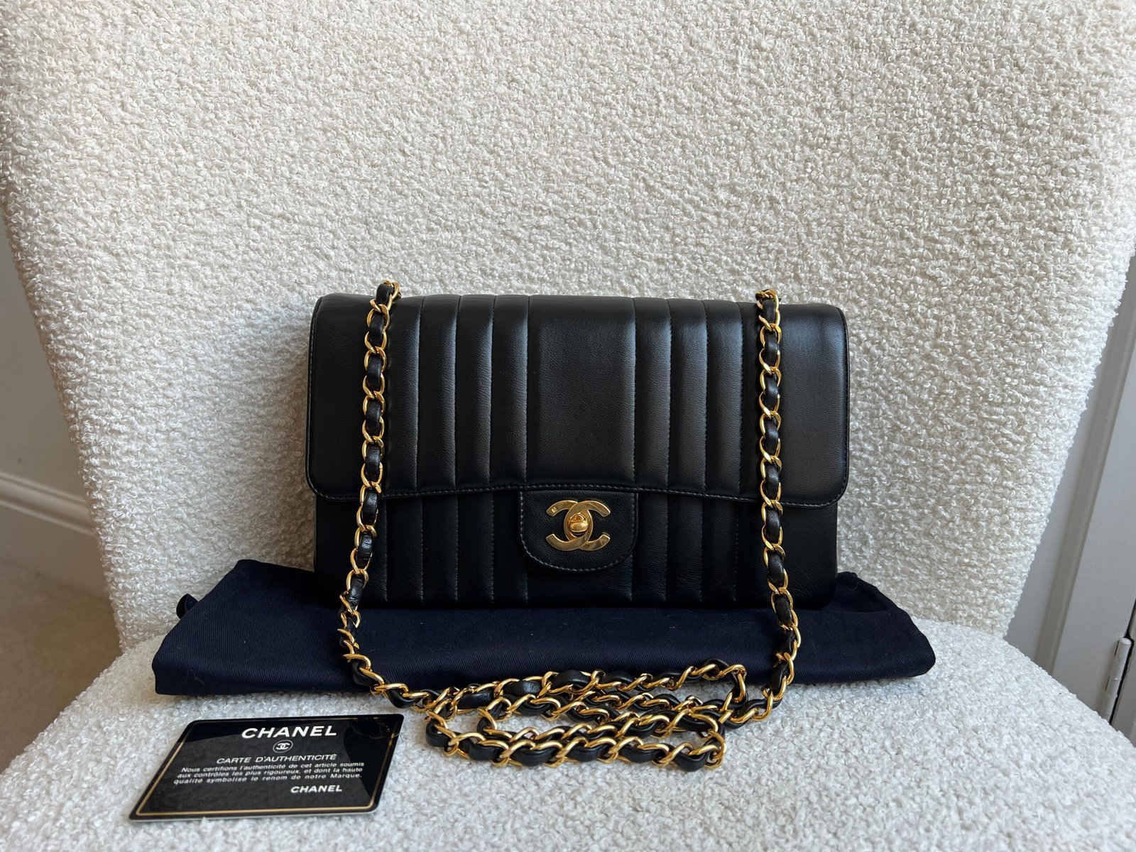Chanel Medium Black Vertical Quilted Lambskin Vintage Classic Flap Bag with 24K gold hardware
